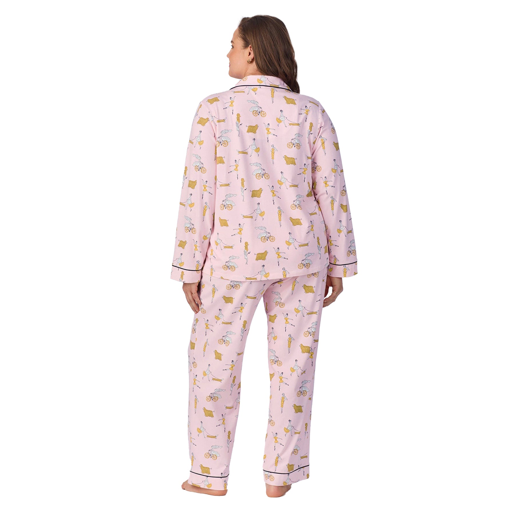 Back view of a plus-size model in the same pink pajama set, showing the all-over whimsical print.