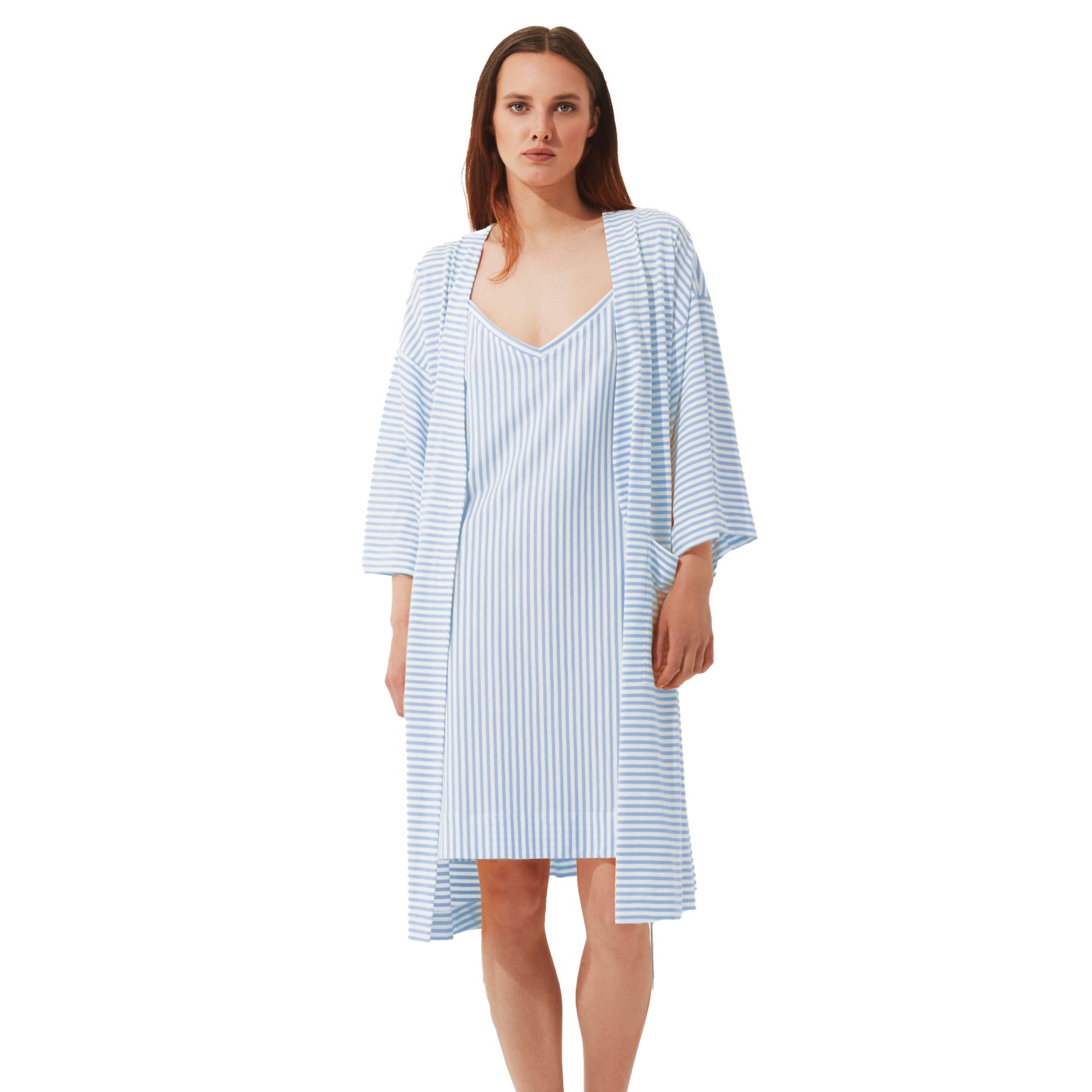 Woman wearing a lightweight blue and white striped robe layered over a matching sleeveless nightdress by Pluto, mid-length with 3/4 sleeves.