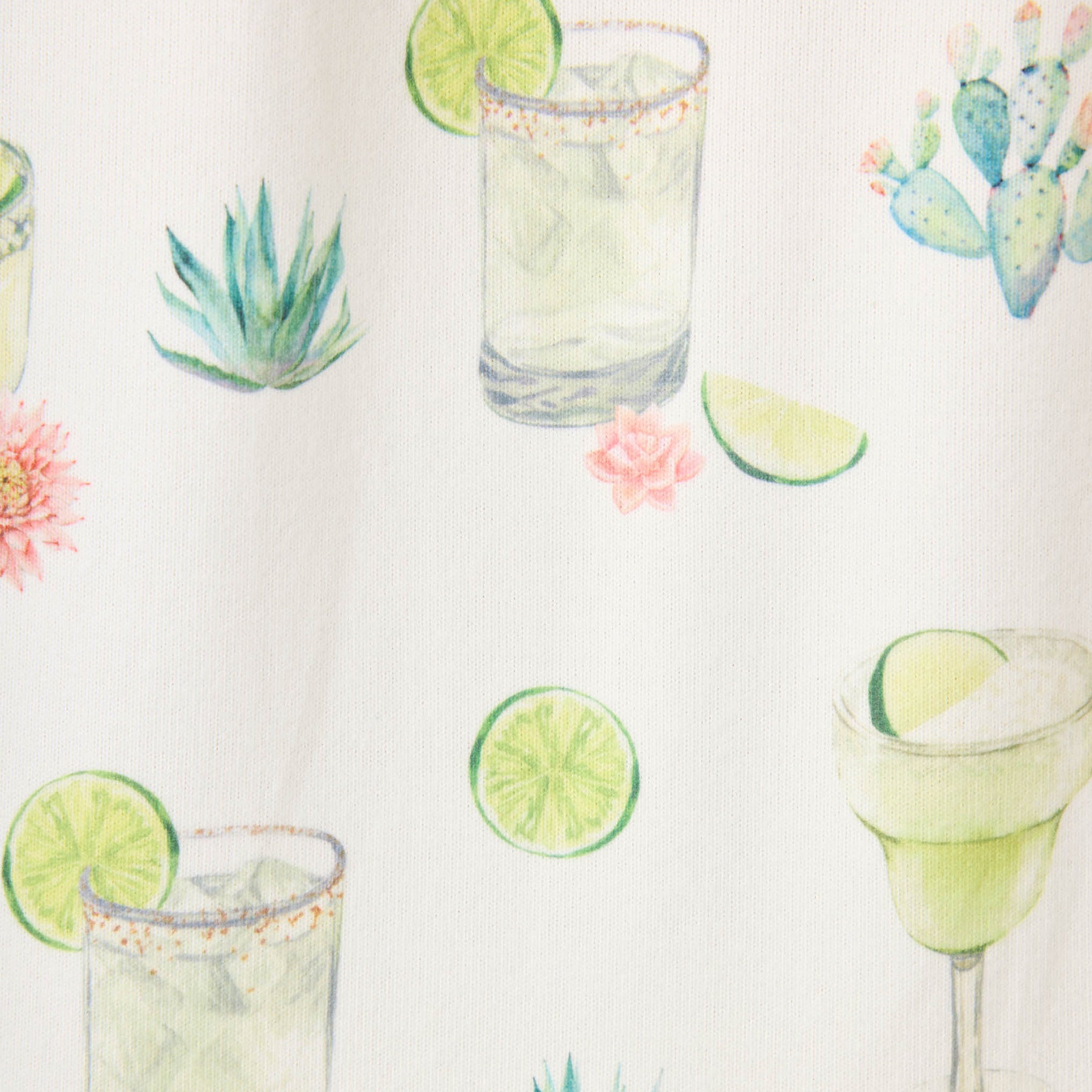 Close-up of white fabric with watercolor-style margarita glasses, limes, succulents, and cacti print.