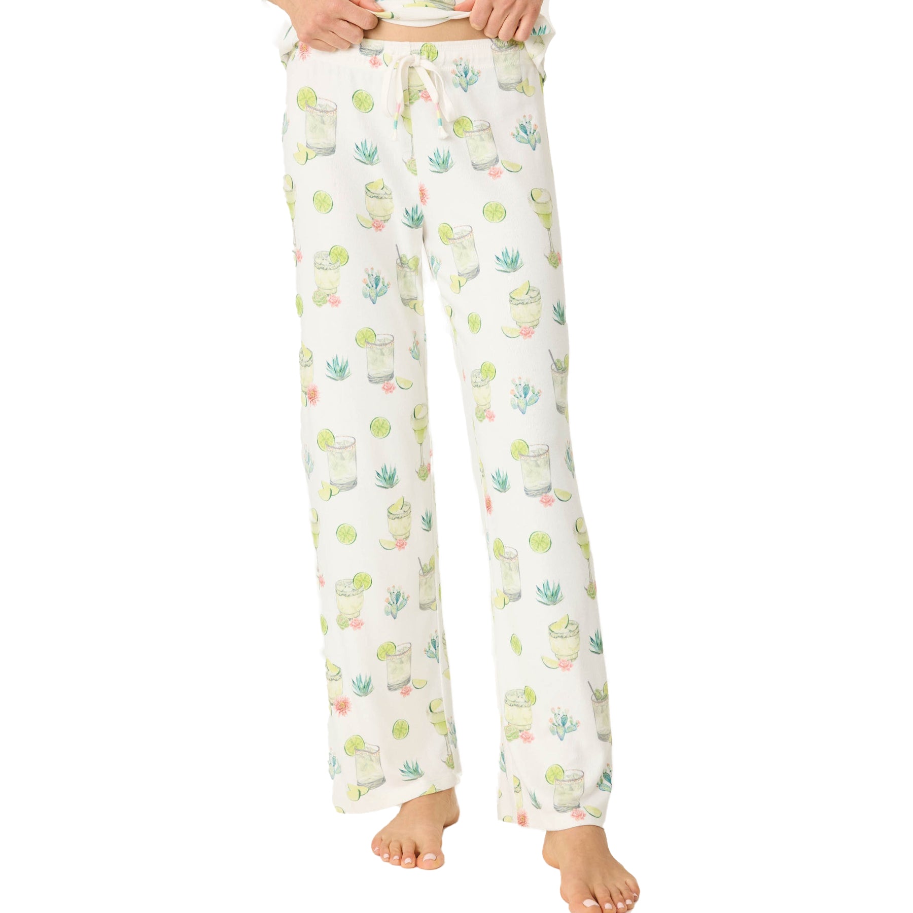 Front view of full-length white pajama pants with watercolor margarita, lime, and cactus illustrations.