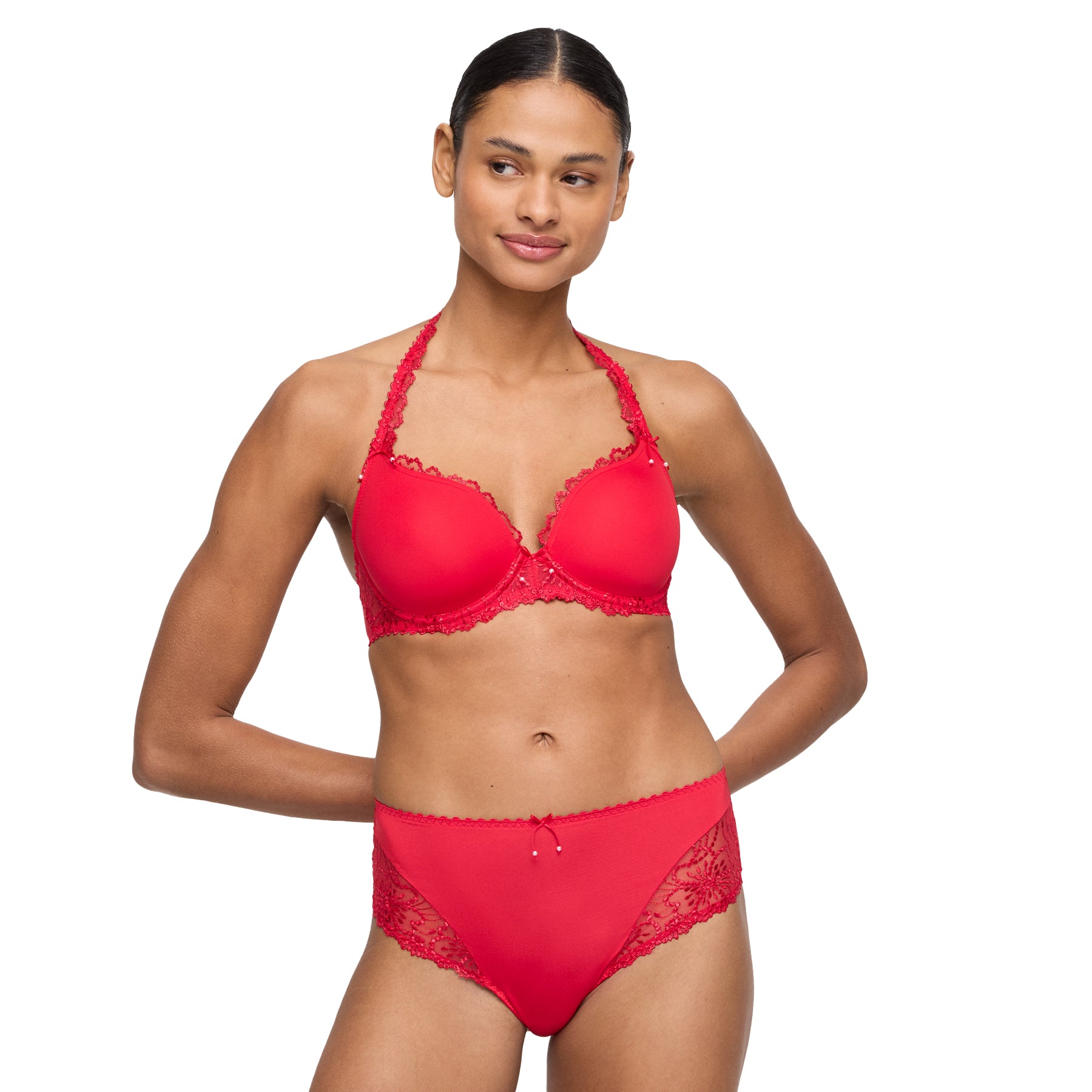 Model wearing red padded bra with lace trim and matching high-waisted brief.
