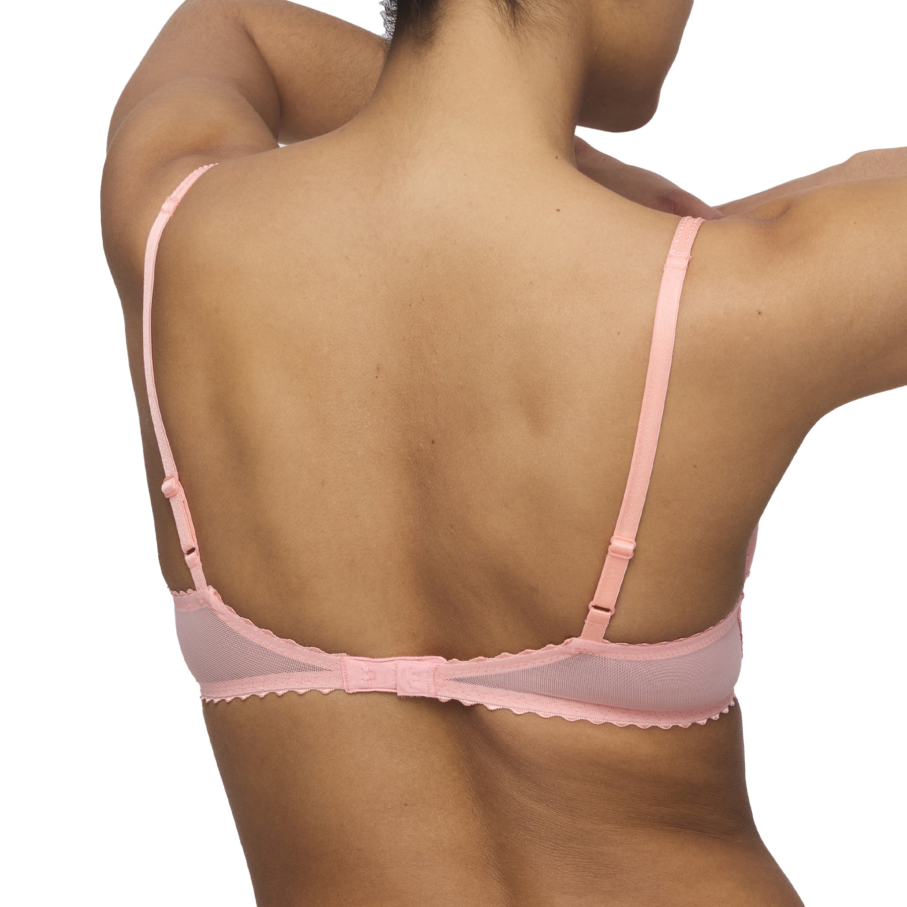 A modal showing floral embroidery bra by Marie jo in flay layout in peachy pink colour, back view.