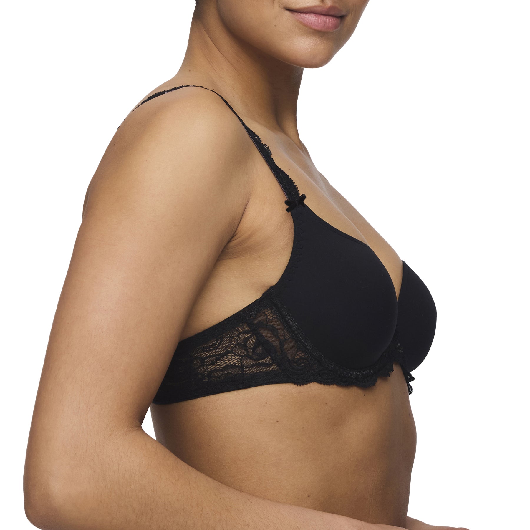 Side angle of a black bra showing structured cups and sheer lace side band.