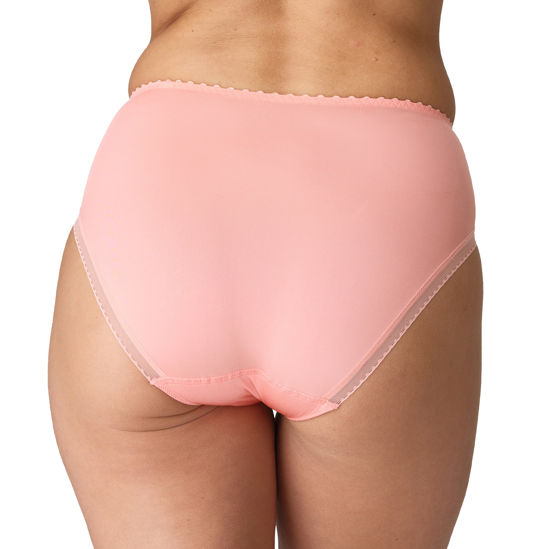 A mode wearing full brief in florida (peachy pink) colour, back view.