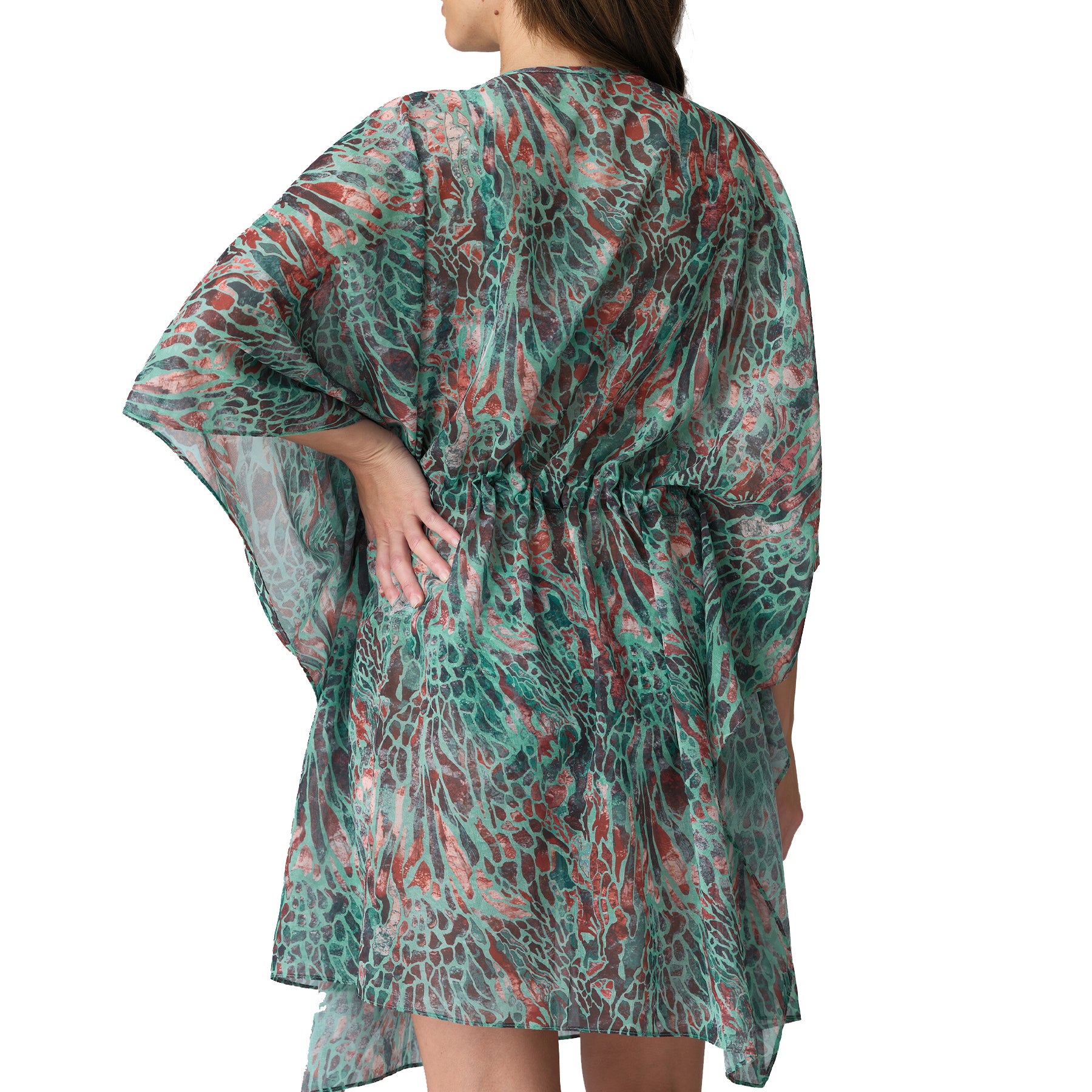 A model wearing a turquoise seas print sheer cover-up, back view.