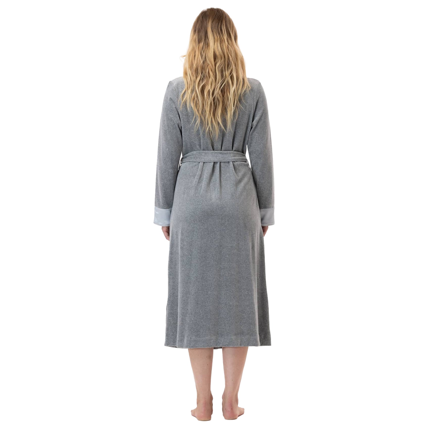 A model posing to show a back view of the wrap robe.