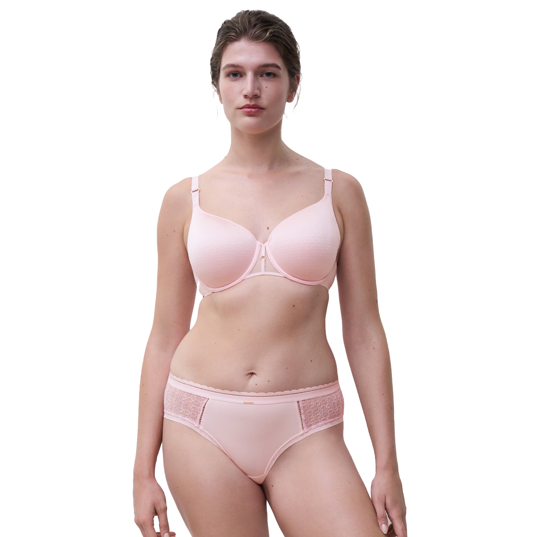 A model wearing a pink Chantelle bra on the white background. 