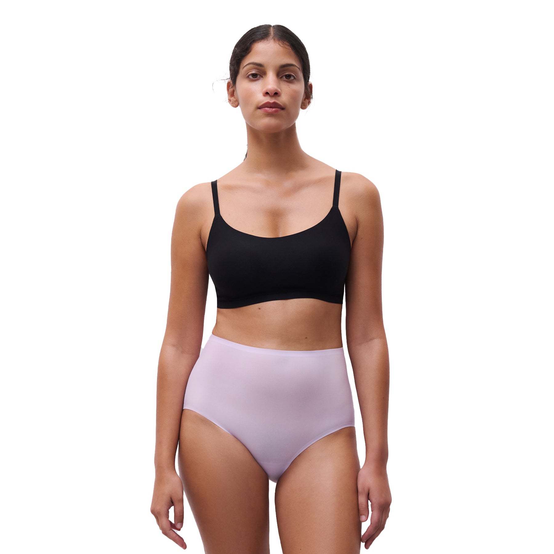 A model wearing a lavender chantelle full brief on the white background, front view.