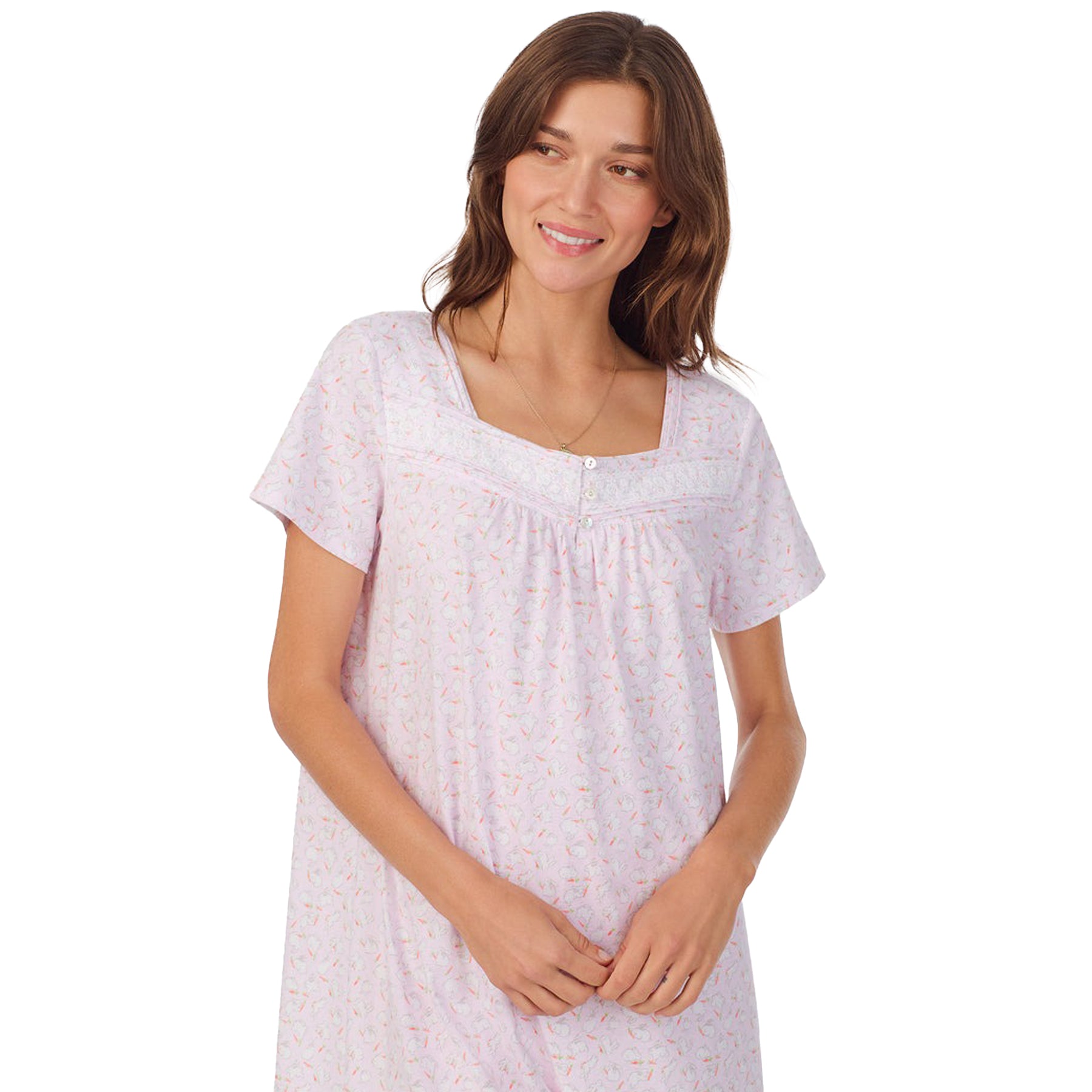 Front view of a women's floral nightshirt in a "sweet bunny" print showcasing intricate lace trim and button detailing, fashion photoshoot.