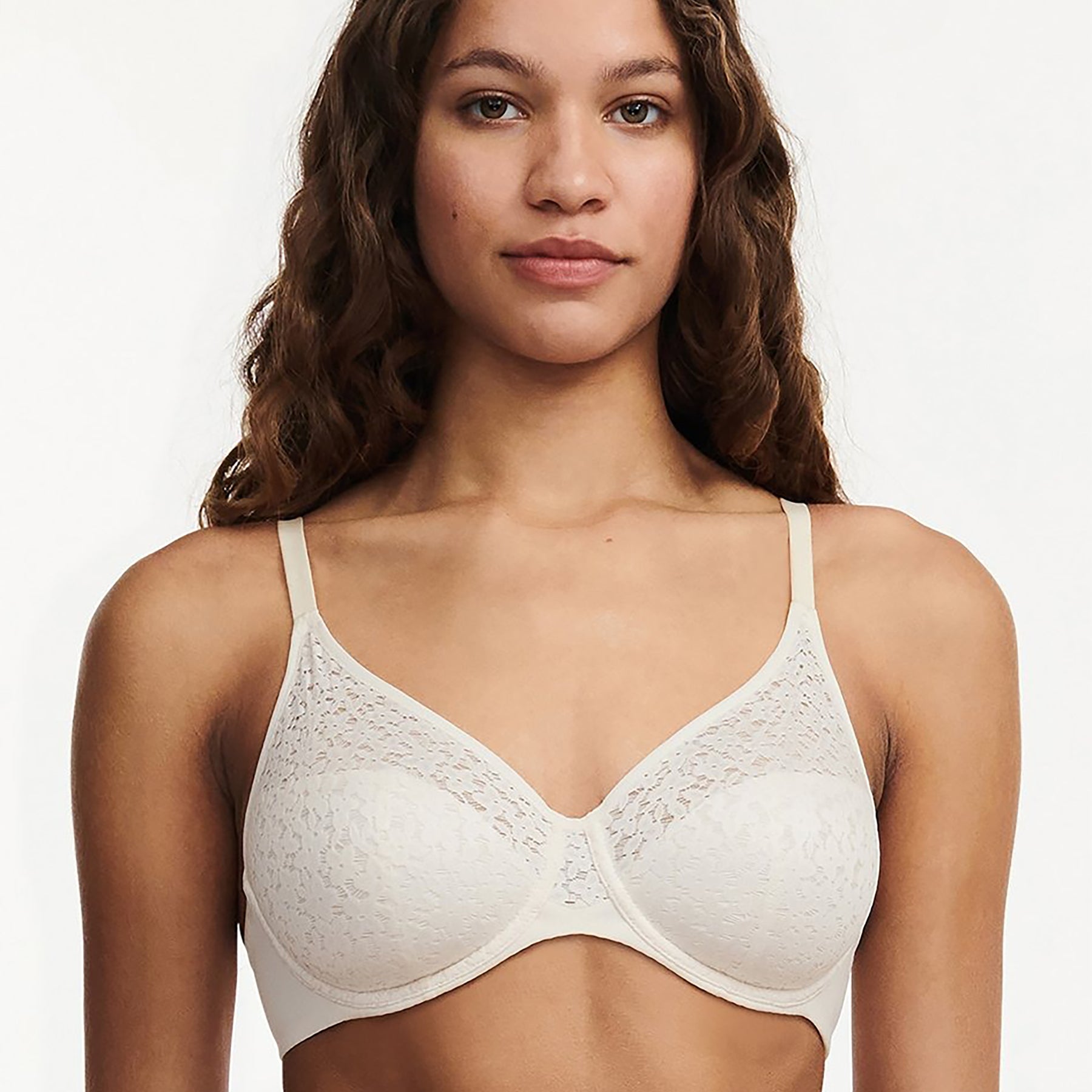 Chantelle Norah Lace Full Cup Seamless Bra in ivory talc. Front view on model.