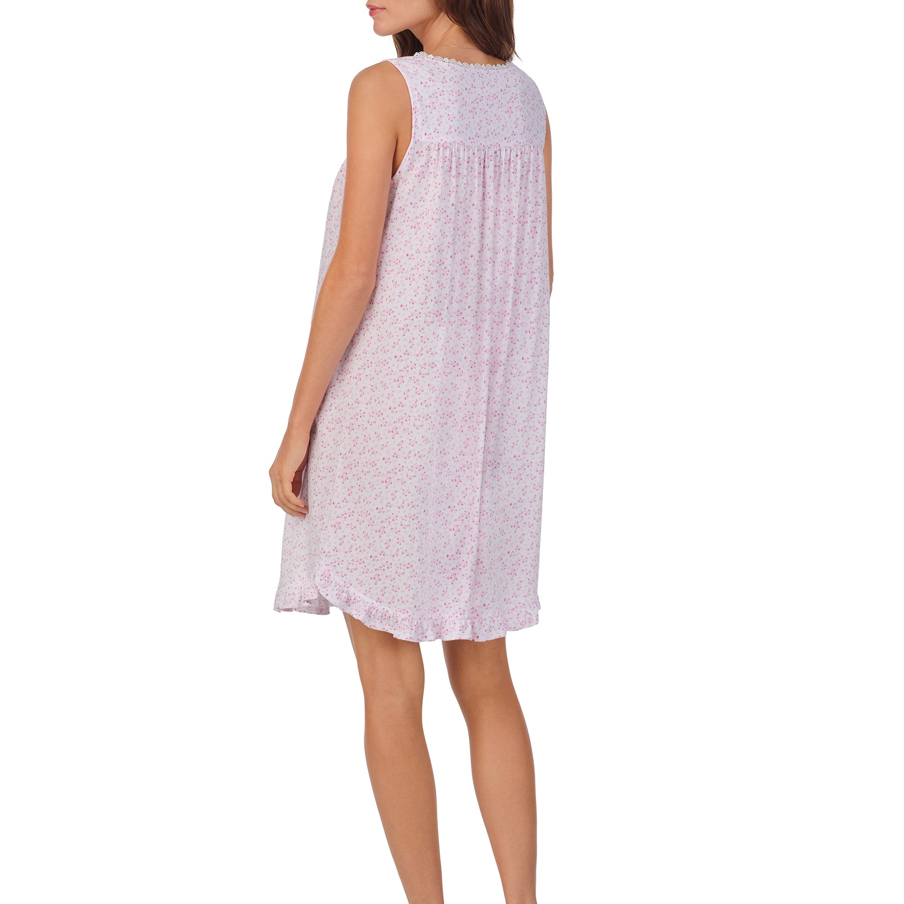 Side/Back view of a women's floral nightshirt in a white pink ditsy print, showcasing intricate lace trim, button detailing, and cap sleeves.