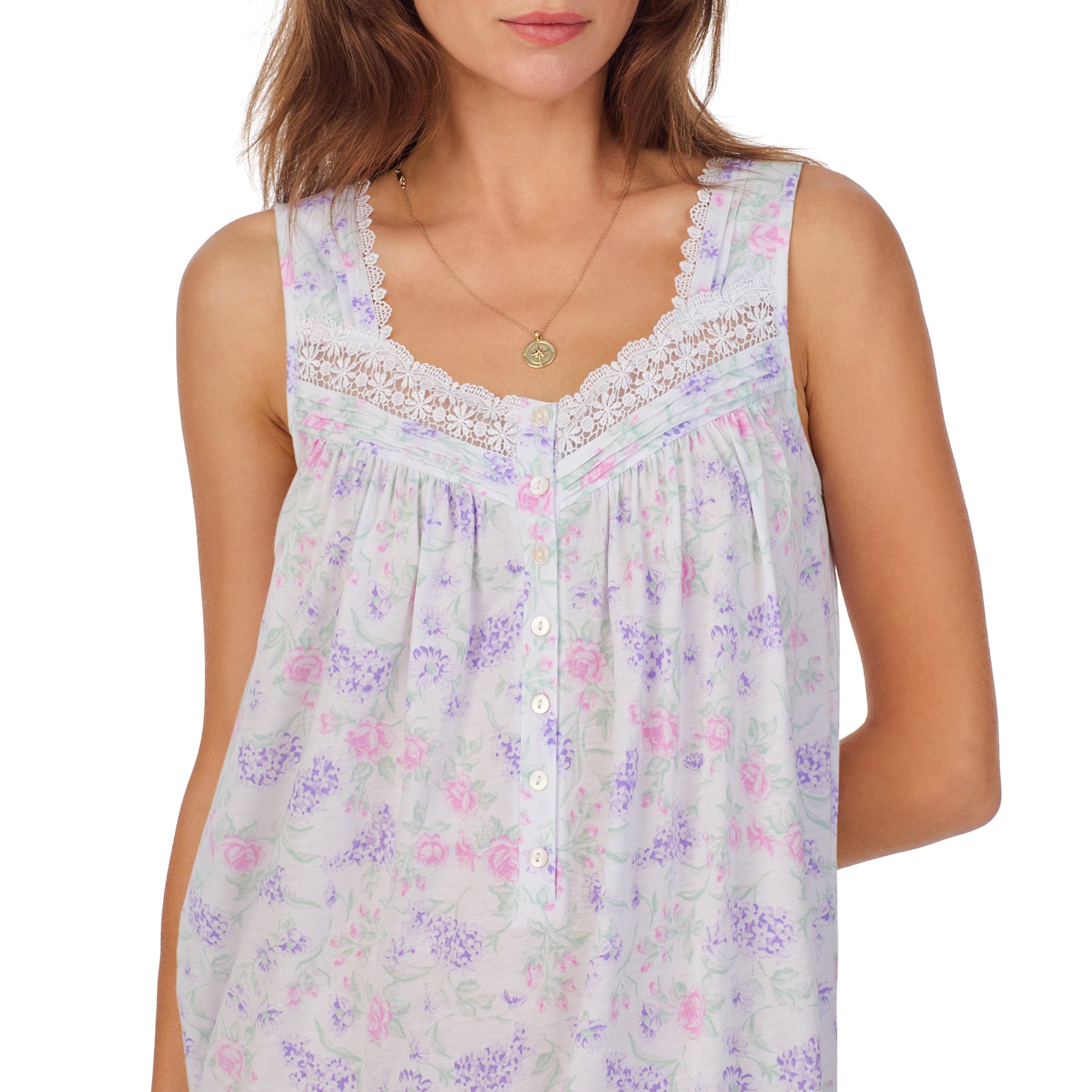 Front view (close -up) of a women's floral nightshirt in a white multi hydrangea print, showcasing intricate lace trim, button detailing, and cap sleeves.