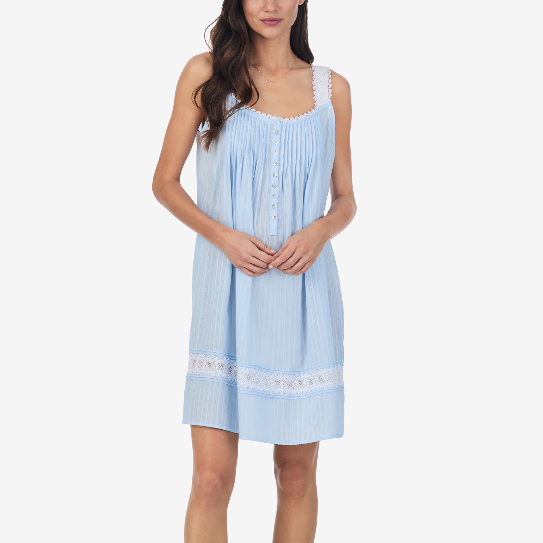 Front view of a women's floral nightshirt in a cottage blue, showcasing intricate lace trim and button detailing.