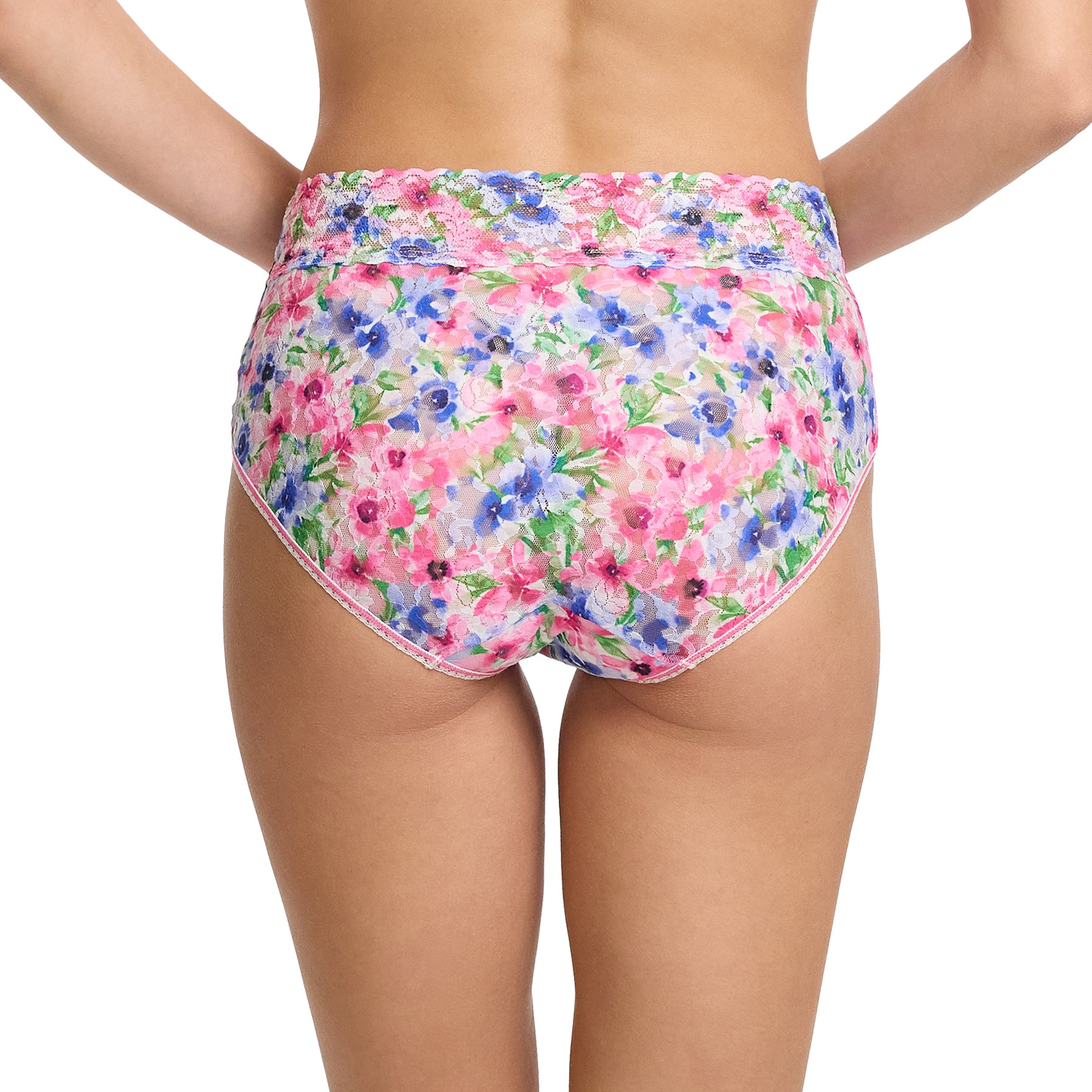 Hanky Panky printed lace high waist french cut full brief in paint and pour: pink, green and blue florals on a white background, rear view on model.