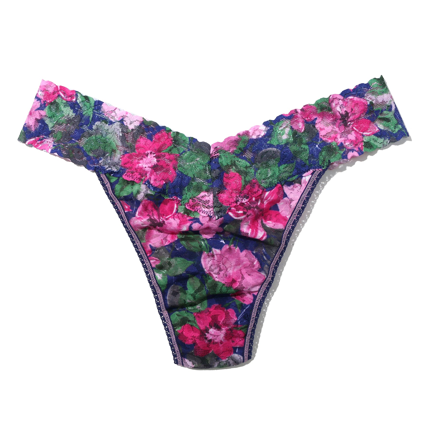 Printed lace original rise thong in tis the season, pink and green florals on a navy background. Flay lay without model.