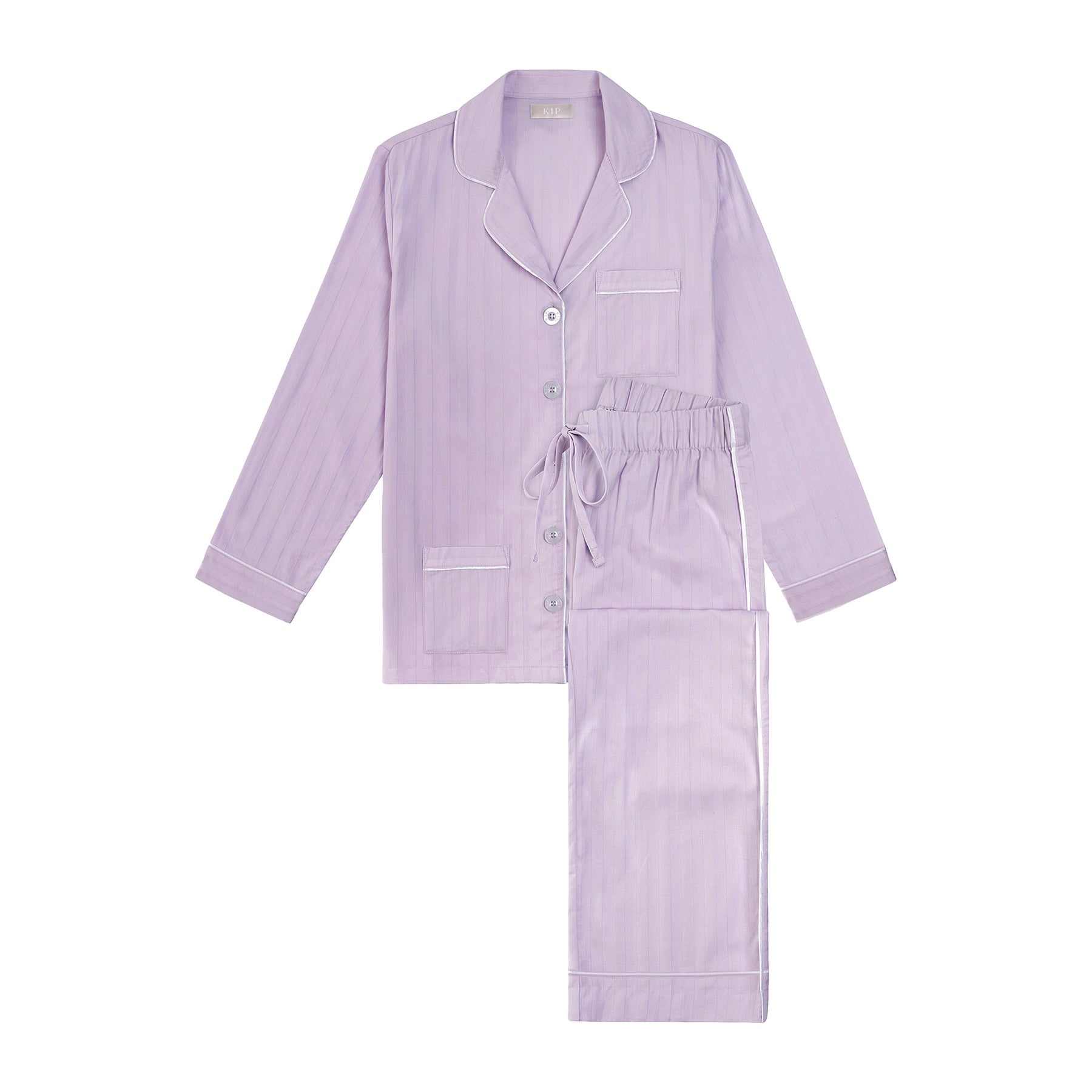 Lavender cotton classic pyjama set with contrast white piping. Front view without model.