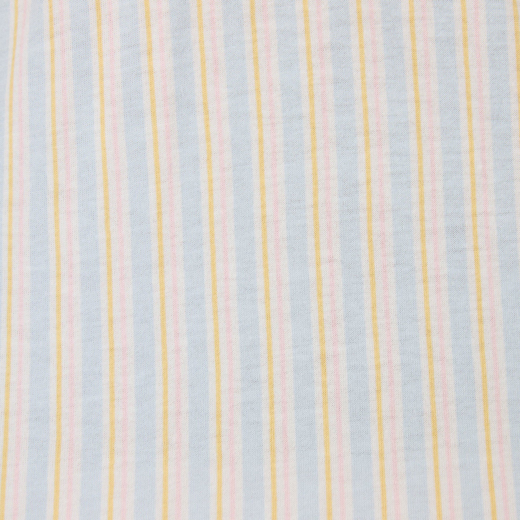 A close-up of striped fabric in soft pastel colors, with alternating blue, yellow, and pink vertical lines.