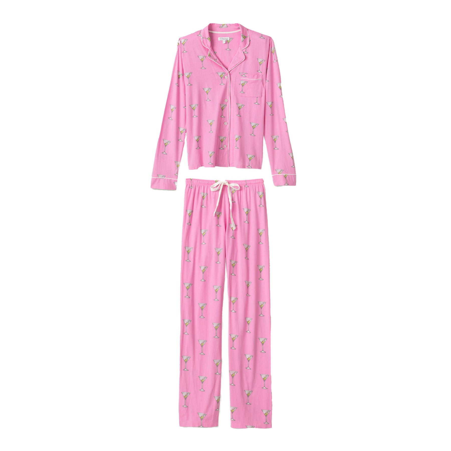 A flat lay of a pink pajama set featuring a button-up top and matching drawstring pants with a martini glass print.